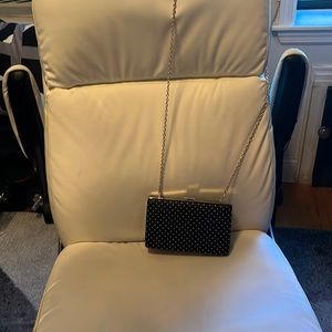 New evening clutch black color one side studded and the back is solid black